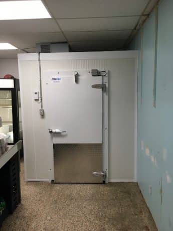 A morgue refrigeration unit provided by Groupe Protec in a room