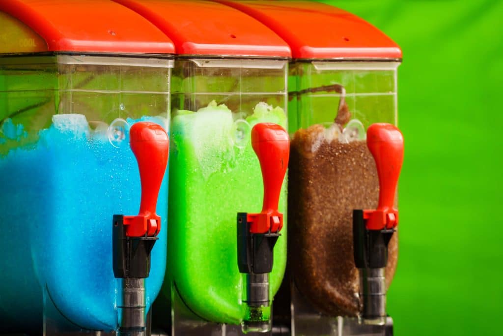Commercial slush machines with different colours and flavours